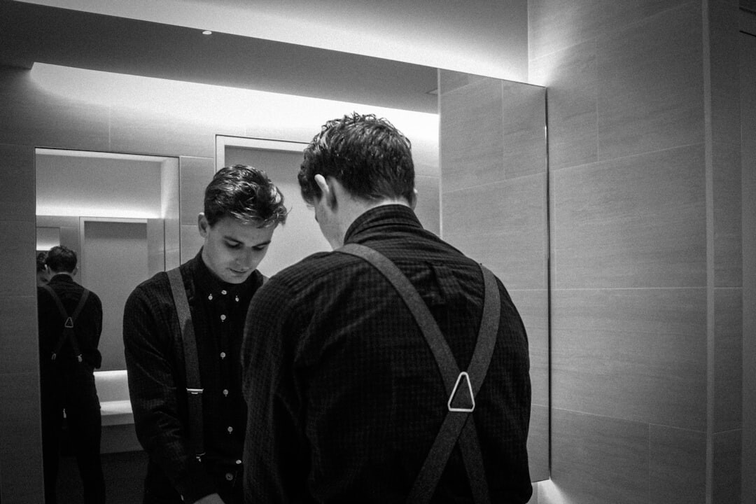 person looking in mirror reflection