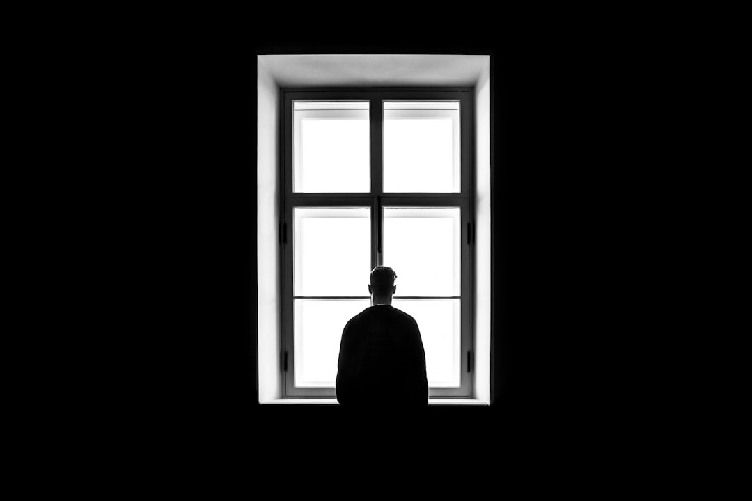 person reflecting on emotions alone
